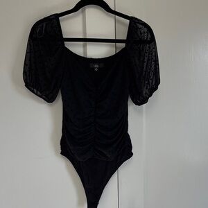 Lulu's Polka Dot Black Puff Sleeve sheer Bodysuit